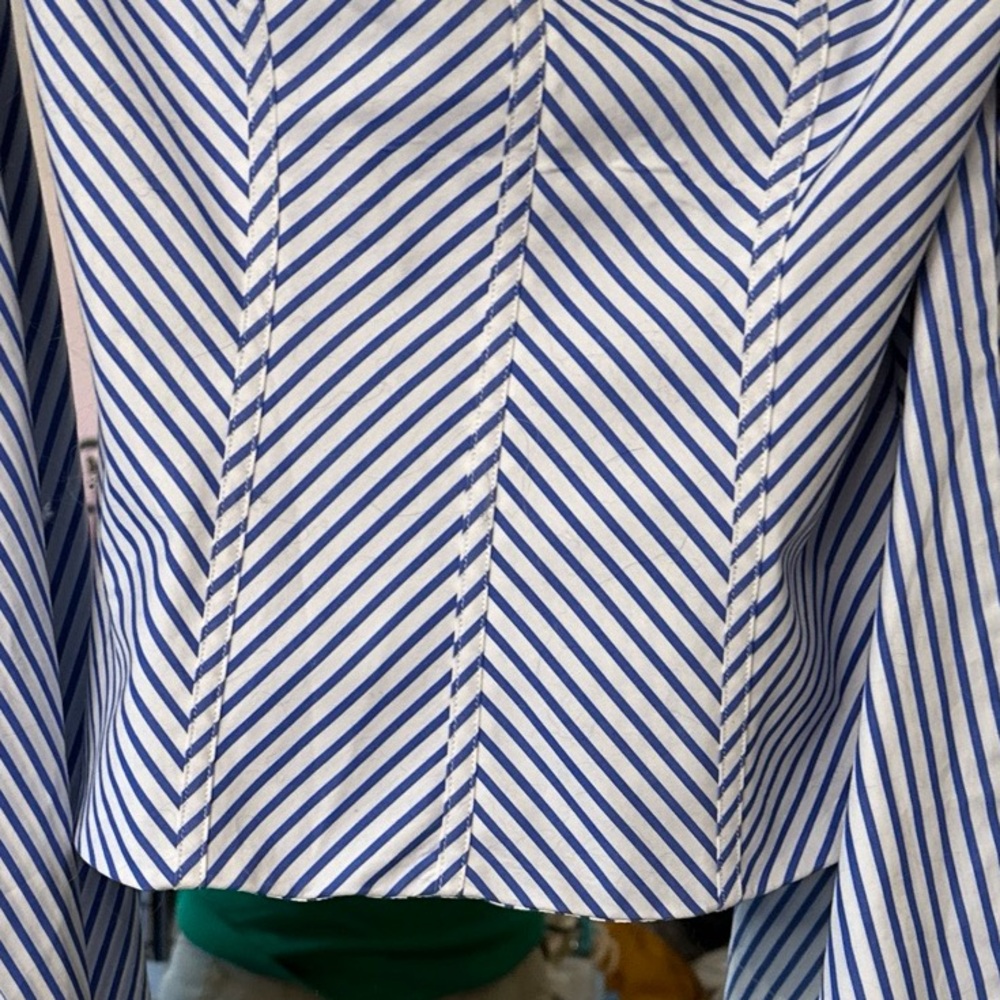 Beautiful Off Shoulder tiered fold Sleeves creating a fun stylish look. Fitted.